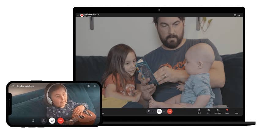 父亲和他的孩子和年轻女孩弹吉他在笔记本电脑和智能手机视频会议使用Skype。